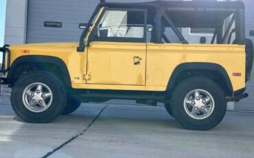 Land-rover-Defender-1994-YellowBlack-Top-Black-8