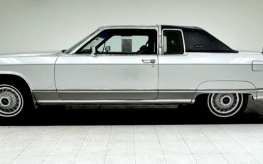 Lincoln-Continental-1976-Silver-Diamond-Fire-Black