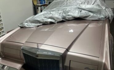 Lincoln-Mark-v-1979-Light-Metallic-Red