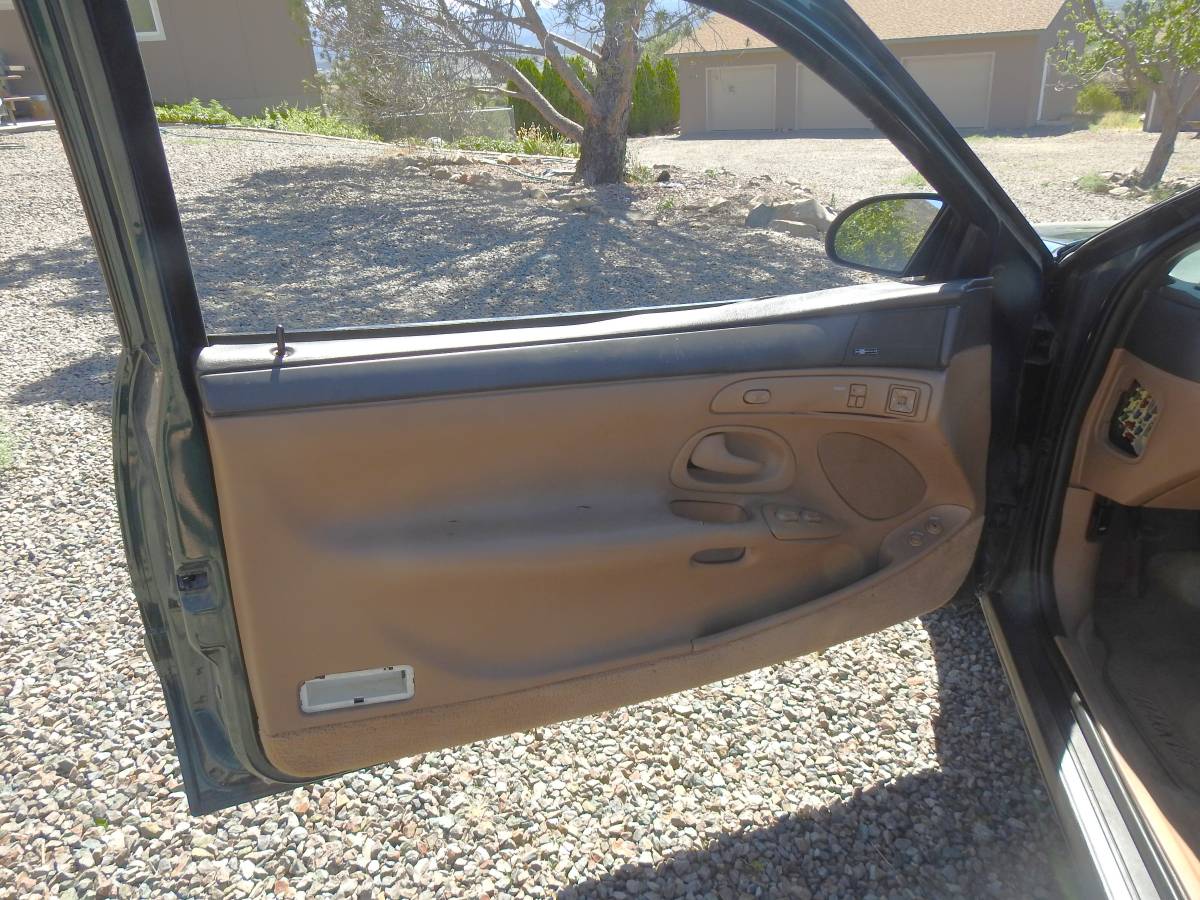 Lincoln-Mark-viii-1995-green-7