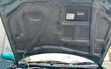 Mazda-Mazda3-1995-Sedan-12