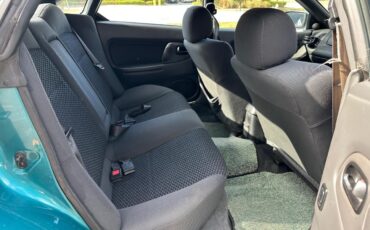 Mazda-Mazda3-1995-Sedan-14