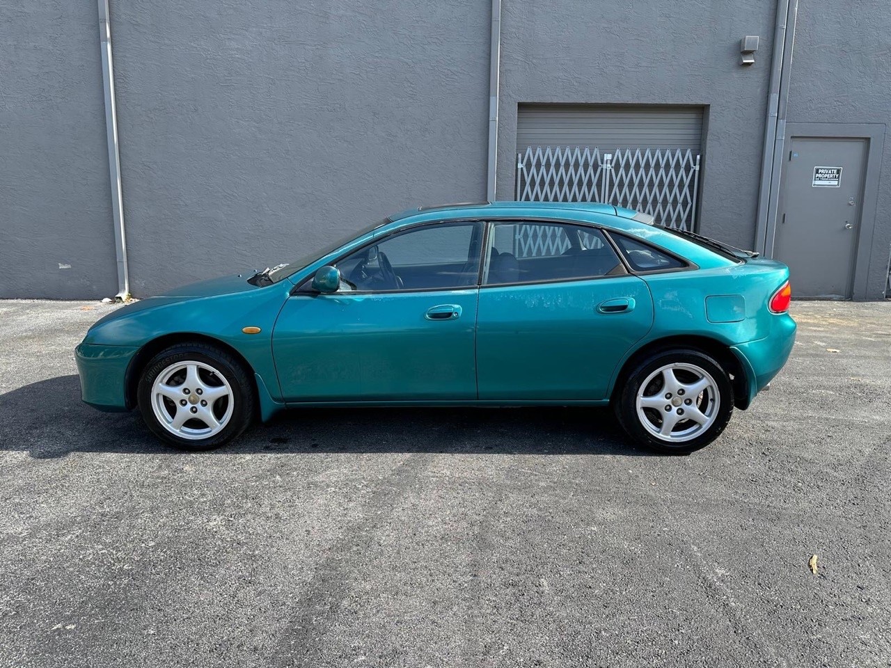 Mazda-Mazda3-1995-Sedan-2