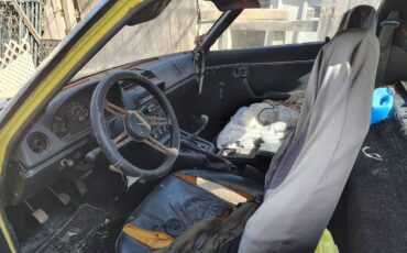 Mazda-rx7-1979-yellow-17
