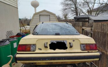 Mazda-rx7-1979-yellow-21