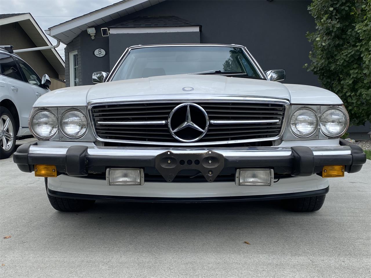 Mercedes-benz-560sl-1986-Artic-white-Blue-1