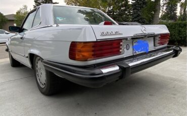 Mercedes-benz-560sl-1986-Artic-white-Blue-19