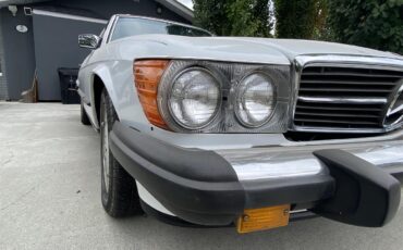 Mercedes-benz-560sl-1986-Artic-white-Blue-2