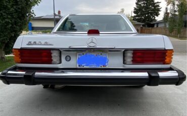 Mercedes-benz-560sl-1986-Artic-white-Blue-20
