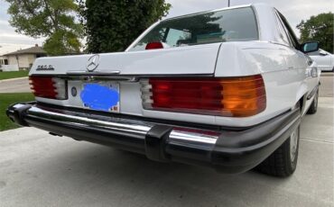 Mercedes-benz-560sl-1986-Artic-white-Blue-21