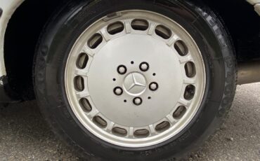 Mercedes-benz-560sl-1986-Artic-white-Blue-25
