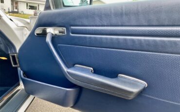 Mercedes-benz-560sl-1986-Artic-white-Blue-26