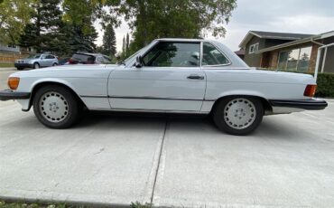 Mercedes-benz-560sl-1986-Artic-white-Blue-4