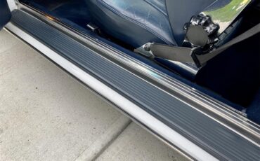 Mercedes-benz-560sl-1986-Artic-white-Blue-7