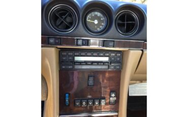 Mercedes-benz-560sl-1987-Cabernet-Red-Beige