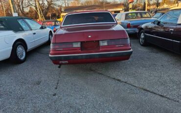 Mercury-Cougar-1985-Red-Gray