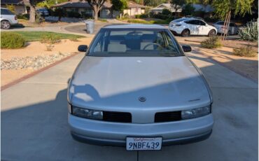 Oldsmobile-2-dr-sedan-1988-silver-gray-1