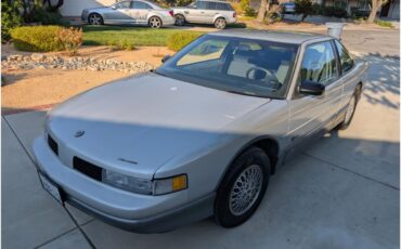Oldsmobile-2-dr-sedan-1988-silver-gray