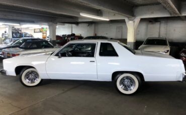 Oldsmobile-98-1977-Alpine-White-Sky-Blue-Crushed-Vel-1