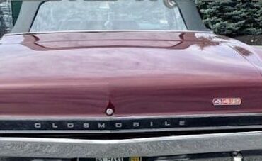 Oldsmobile-Cutlass-1966-MaroonBlack-Top-Black-Vinyl-15