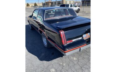 Oldsmobile-Cutlass-1983-Black-Red-3