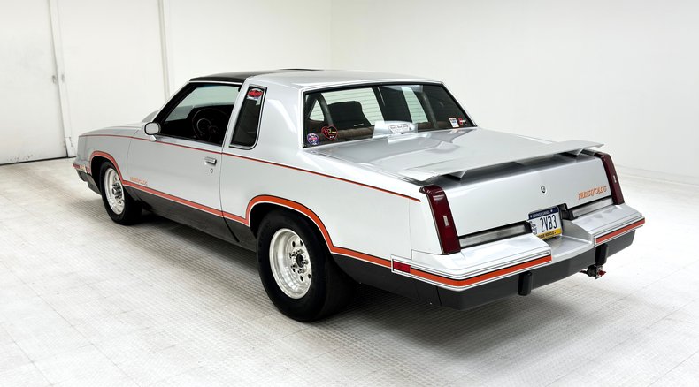 Oldsmobile-Cutlass-1984-Silver-Metallic-Dark-Maple-Red-1