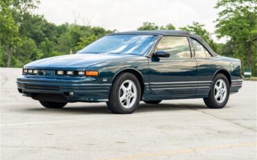 Oldsmobile-Cutlass-1995-Dark-Teal-Metallic-Graphite-1