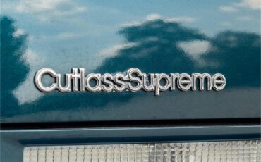 Oldsmobile-Cutlass-1995-Dark-Teal-Metallic-Graphite-10