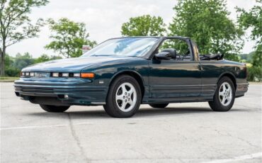 Oldsmobile-Cutlass-1995-Dark-Teal-Metallic-Graphite-2