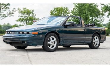 Oldsmobile-Cutlass-1995-Dark-Teal-Metallic-Graphite
