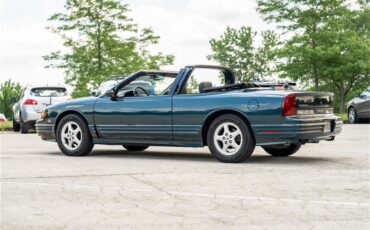 Oldsmobile-Cutlass-1995-Dark-Teal-Metallic-Graphite-4