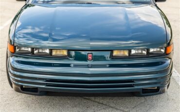 Oldsmobile-Cutlass-1995-Dark-Teal-Metallic-Graphite-45