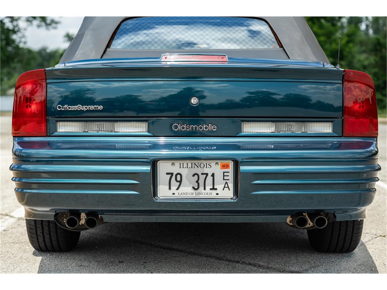 Oldsmobile-Cutlass-1995-Dark-Teal-Metallic-Graphite-48