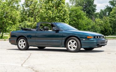 Oldsmobile-Cutlass-1995-Dark-Teal-Metallic-Graphite-6