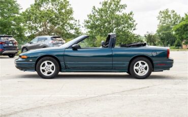 Oldsmobile-Cutlass-1995-Dark-Teal-Metallic-Graphite-74