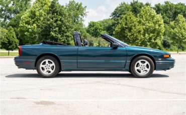 Oldsmobile-Cutlass-1995-Dark-Teal-Metallic-Graphite-76