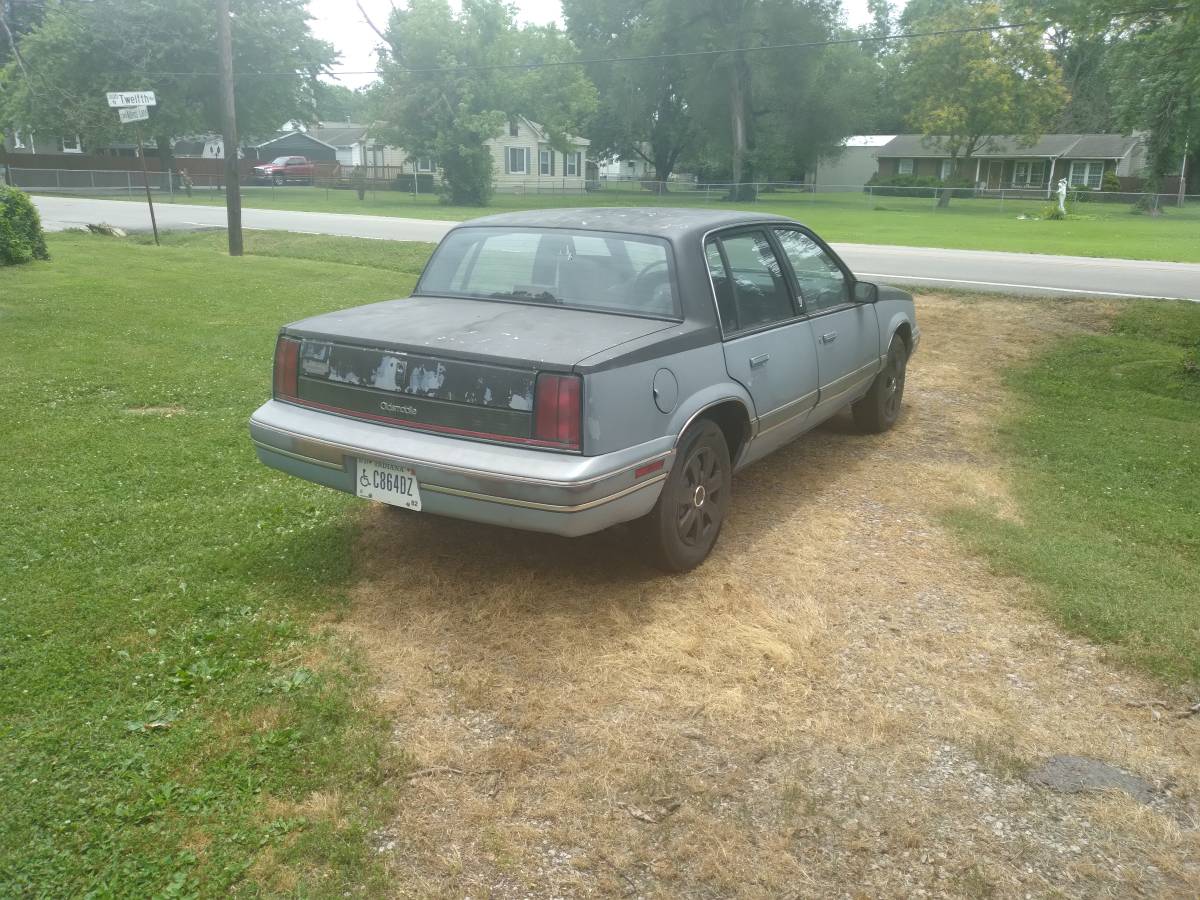 Oldsmobile-Cutlass-calais-s-1989-grey-1