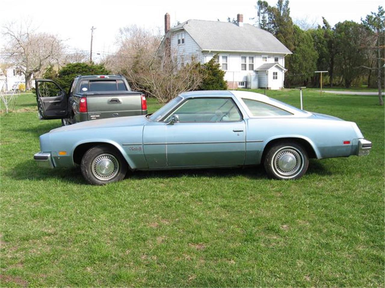 Oldsmobile-Cutlass-s-1977-Blue-White-White-1