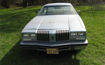 Oldsmobile-Cutlass-s-1977-Blue-White-White-2