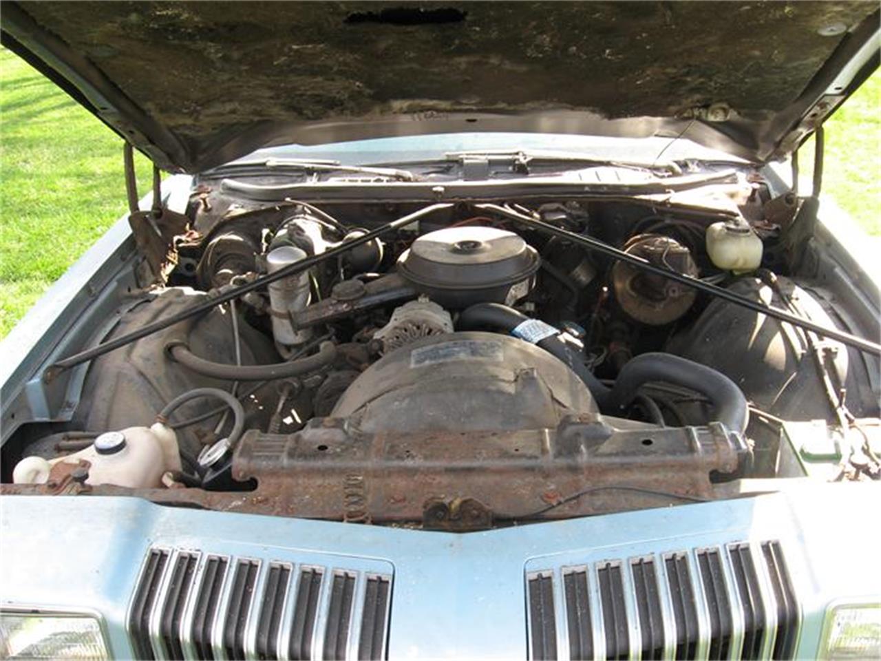 Oldsmobile-Cutlass-s-1977-Blue-White-White