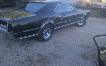 Oldsmobile-Cutlass-supreme-1967-black-1