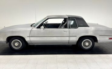 Oldsmobile-Cutlass-supreme-1985-Silver-Metallic-Gray