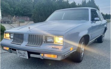 Oldsmobile-Cutlass-supreme-brougham-1984-Blue-Dark-blue-1