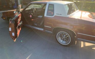 Oldsmobile-Cutlass-supreme-brougham-1988-Burgundy-Metallic-Dark-Claret-Cloth-1