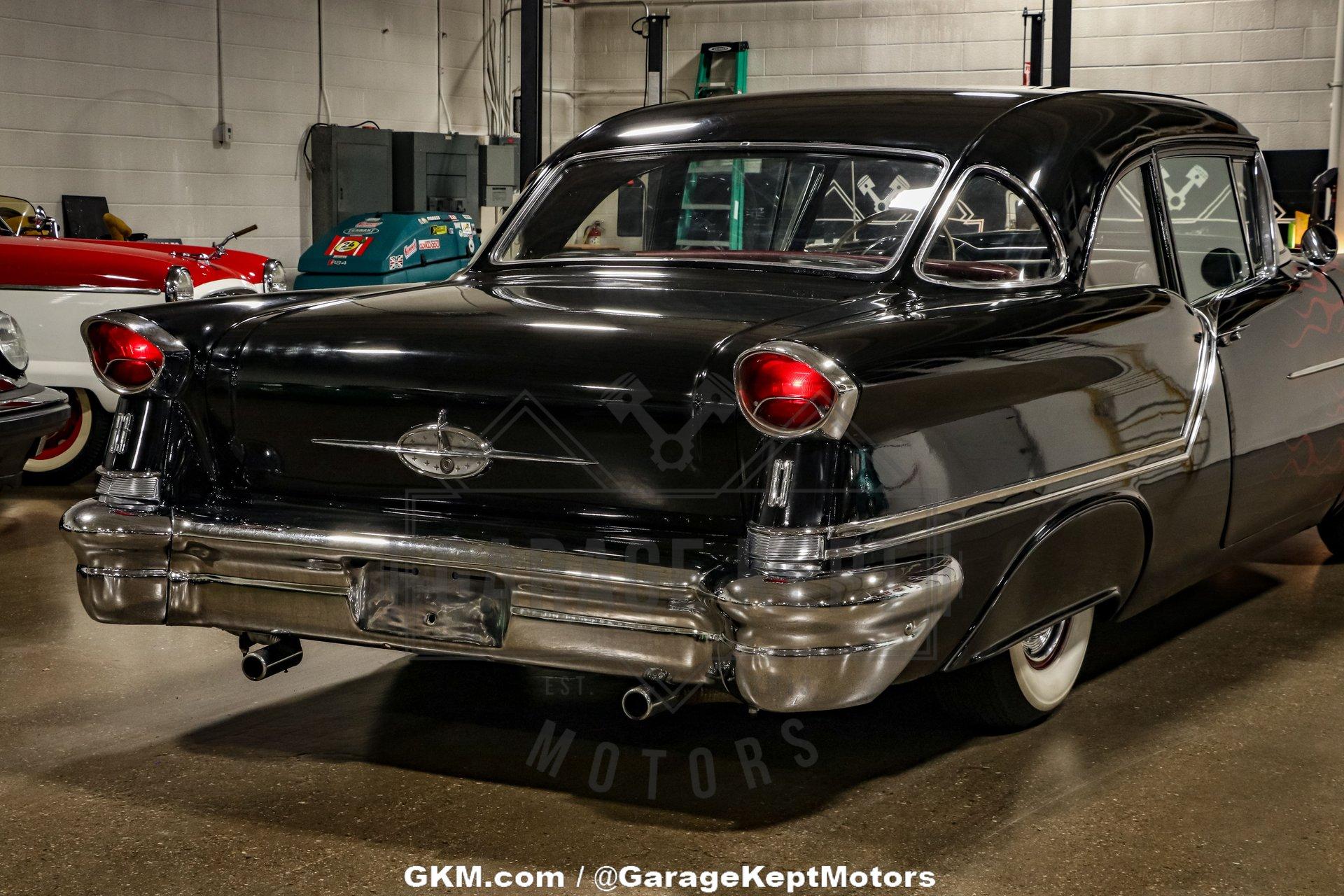 Oldsmobile-Golden-rocket-88-1957-Black-Red-23