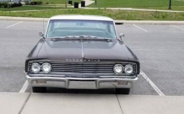 Oldsmobile-Holiday-1963-Brown-5