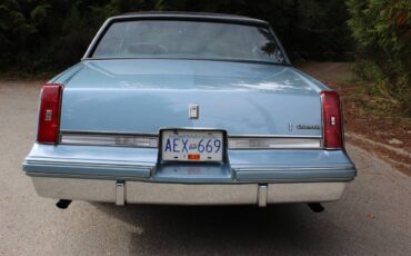 Oldsmobile-cutlass-supreme-supreme-brougham-1985-blue-23