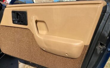 Pontiac-Fiero-1984-Blue-Tan-12