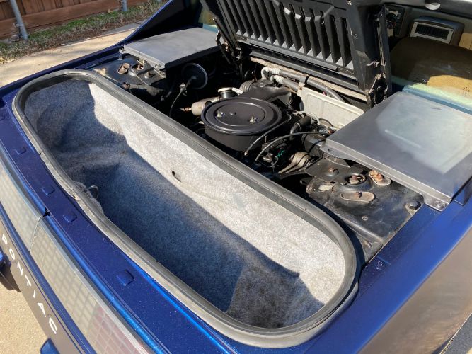 Pontiac-Fiero-1984-Blue-Tan-15