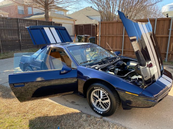 Pontiac-Fiero-1984-Blue-Tan-23